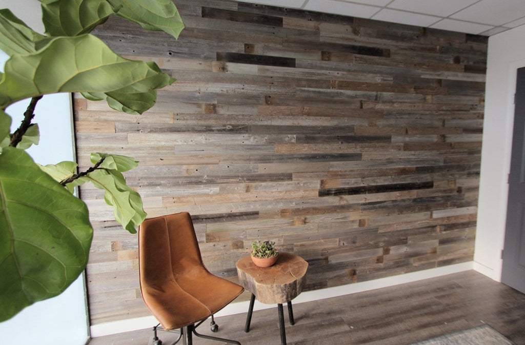 Reclaimed barn wood planks for walls. DIY reclaimed barn wood wall.